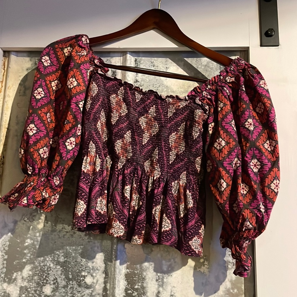 This is a spunky, fun, color-full shirt!